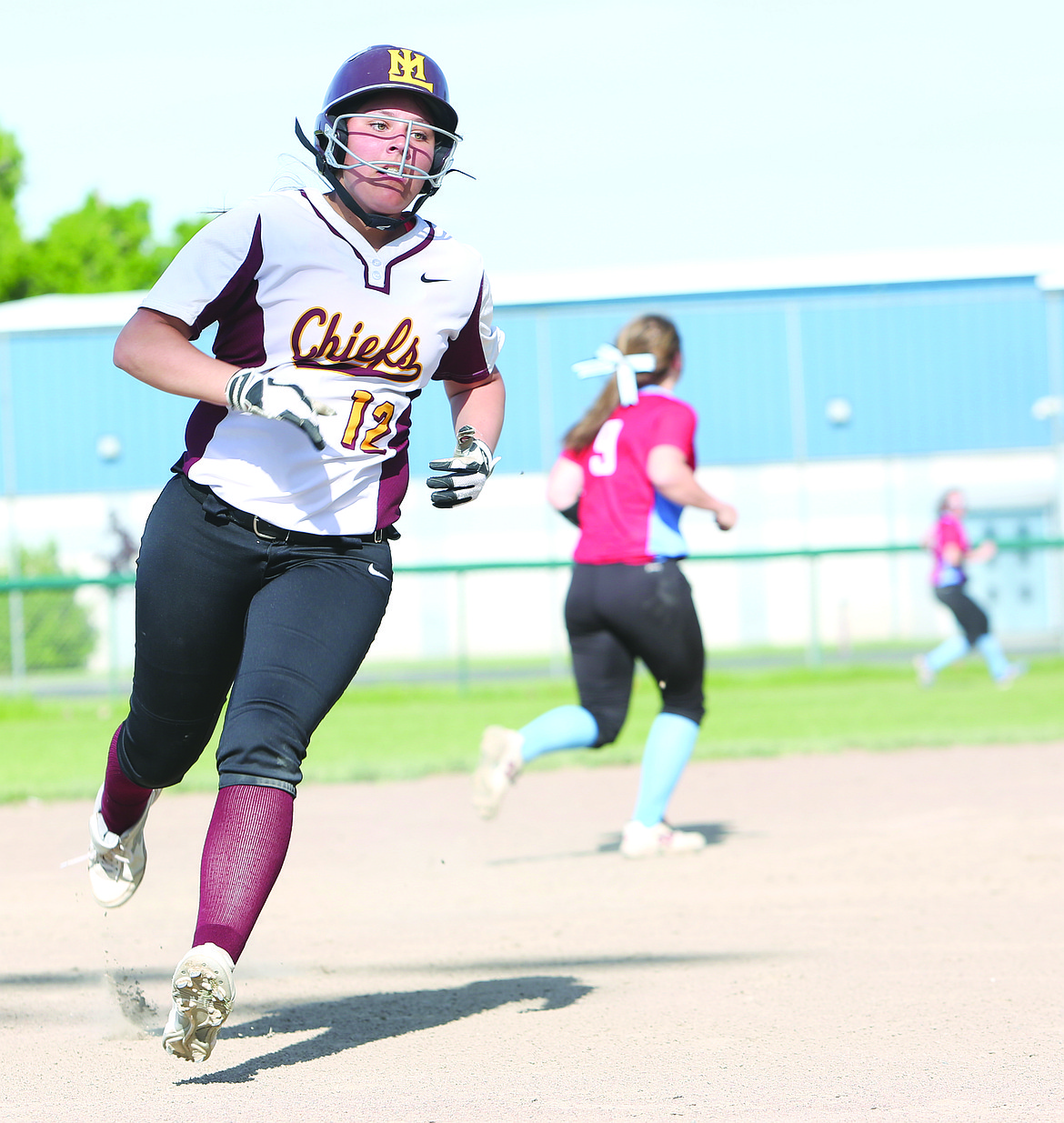 Connor Vanderweyst/Columbia Basin Herald
Brooke Richardson rounds third base and scores in the fourth inning for Moses Lake's first run.