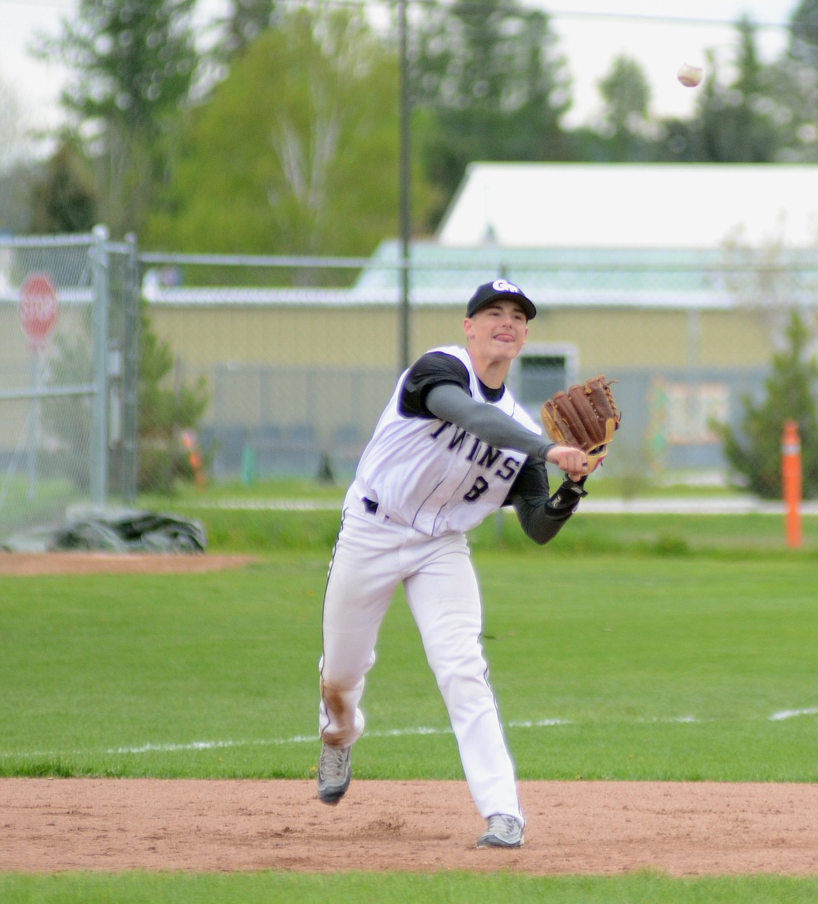 The third basemen for the Twins fires the ball to first for the final out against the Bitterroot Bucs on Saturday.