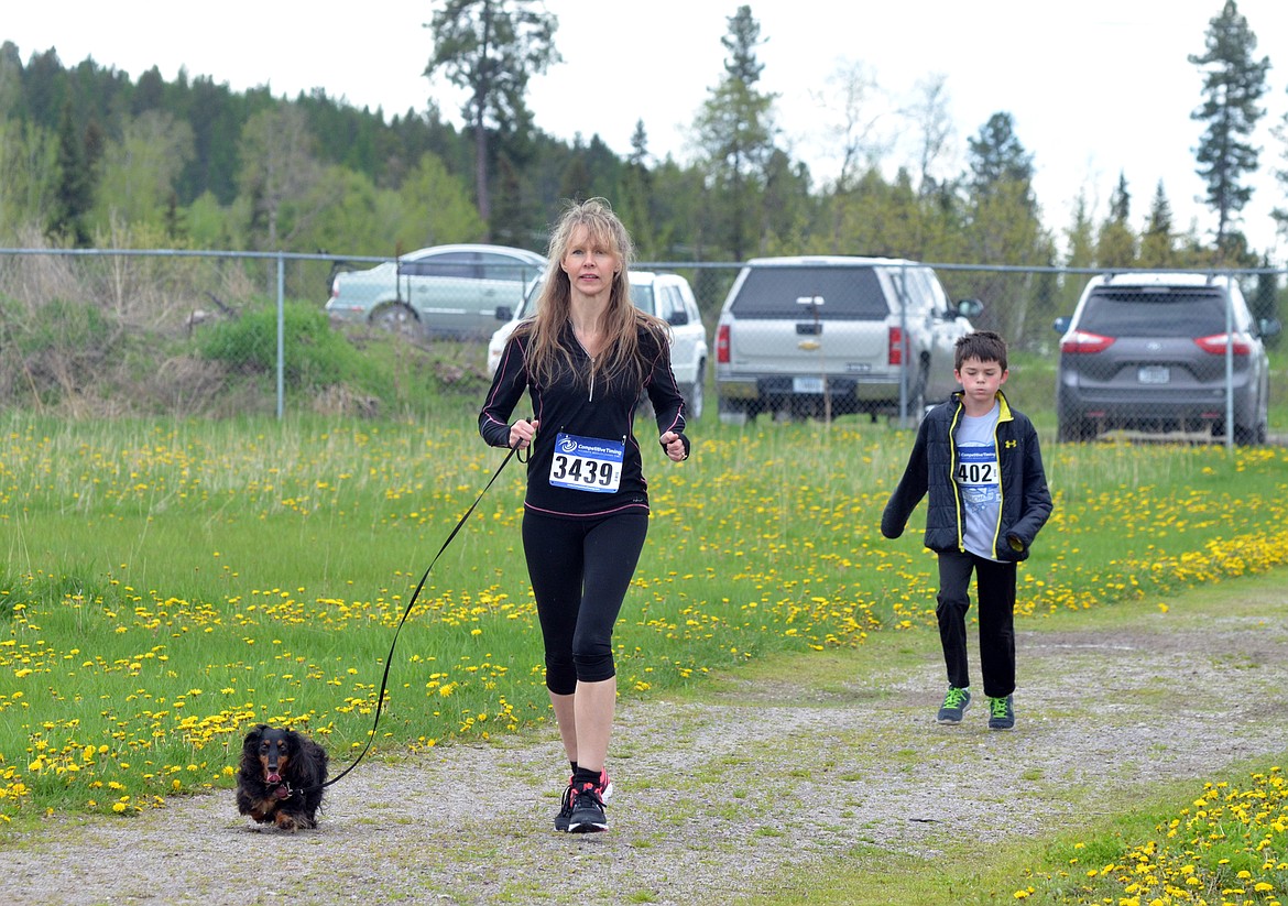 Runners and their dogs competed in the 8th annual WAG race Sunday morning at the Whitefish Hugh Rogers WAG dog park. (Heidi Desch/Whitefish Pilot)