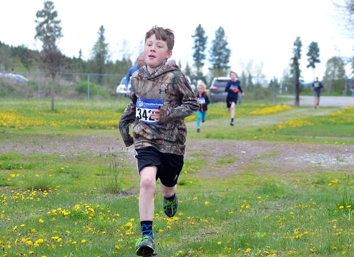 Runners and their dogs competed in the 8th annual WAG race Sunday morning at the Whitefish Hugh Rogers WAG dog park. (Heidi Desch/Whitefish Pilot)