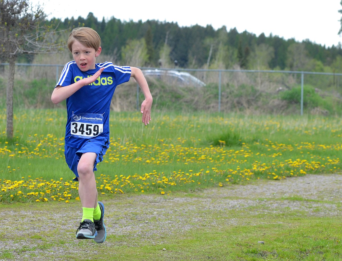 Runners and their dogs competed in the 8th annual WAG race Sunday morning at the Whitefish Hugh Rogers WAG dog park. (Heidi Desch/Whitefish Pilot)