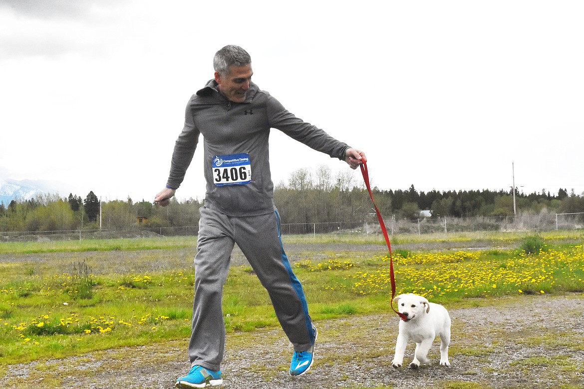 Runners and their dogs competed in the 8th annual WAG race Sunday morning at the Whitefish Hugh Rogers WAG dog park. (Heidi Desch/Whitefish Pilot)