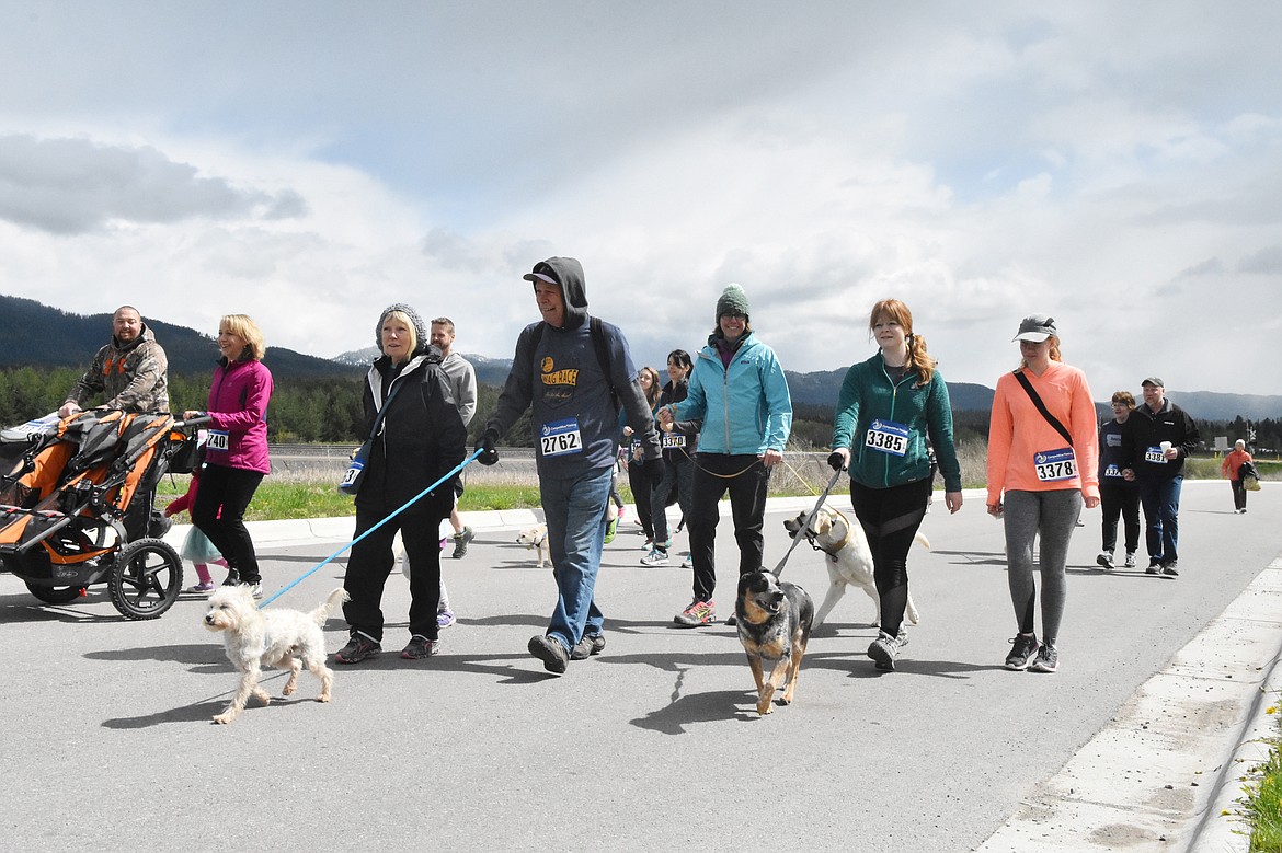 Runners and their dogs competed in the 8th annual WAG race Sunday morning at the Whitefish Hugh Rogers WAG dog park. (Heidi Desch/Whitefish Pilot)