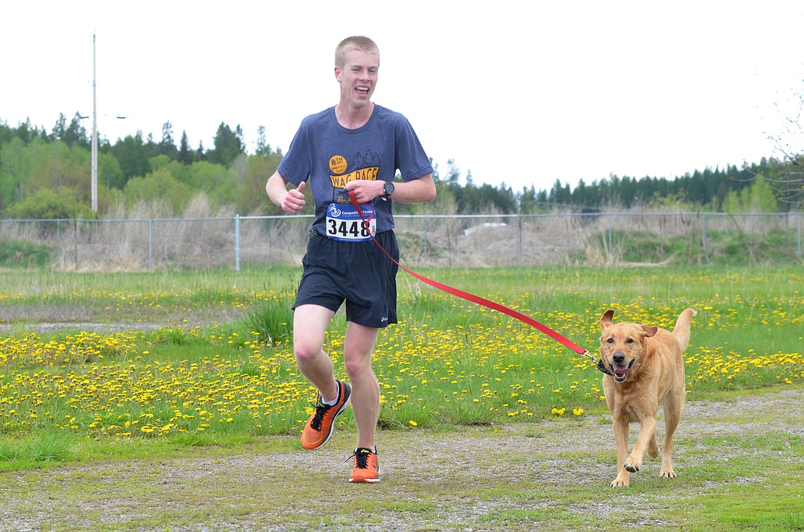 Runners and their dogs competed in the 8th annual WAG race Sunday morning at the Whitefish Hugh Rogers WAG dog park. (Heidi Desch/Whitefish Pilot)