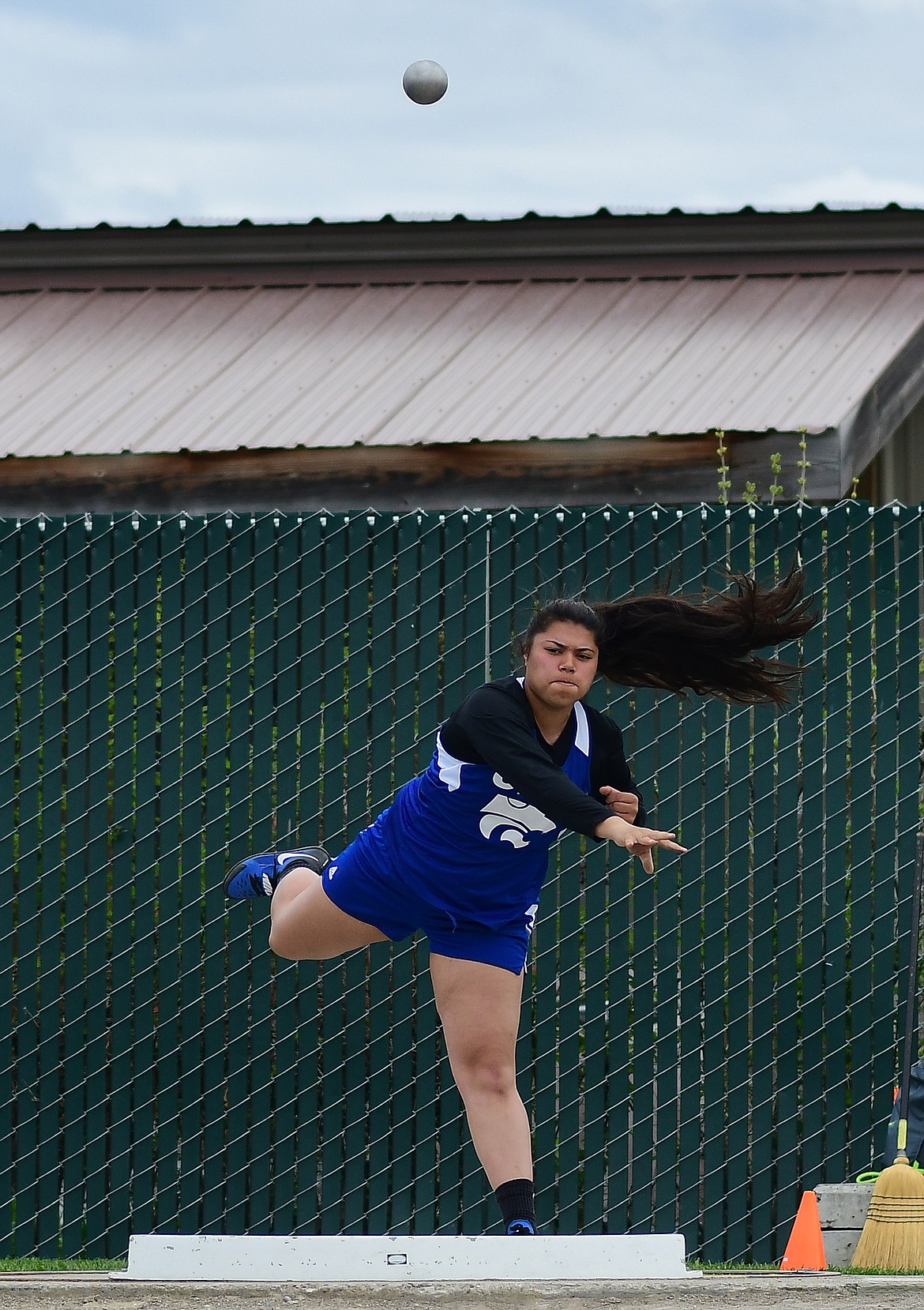 Angellica Street competes in the shot put at Archie Roe.