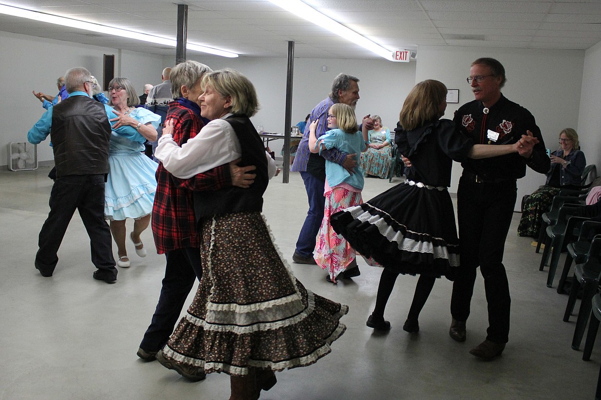 SQUARE DANCERS from all over the area were in Plains on Saturday night while crews from &#147;Backroads of Montana&#148; and &#147;Under the Big Sky&#148; taped upcoming shows. (Kathleen Woodford photos/Clark Fork Valley Press)