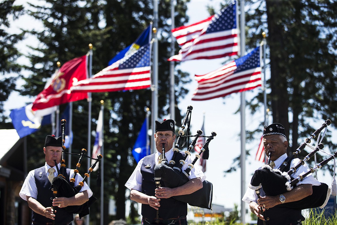 LOREN BENOIT/Press FileBagpipers Kevin Ellison, left, Steve Clark, middle, and Fred Freeman of the Hot Punch Highlanders play &quot;Amazing Grace&quot; during the City of Hayden Memorial Day Remembrance Ceremony at Hayden City Hall last year.
