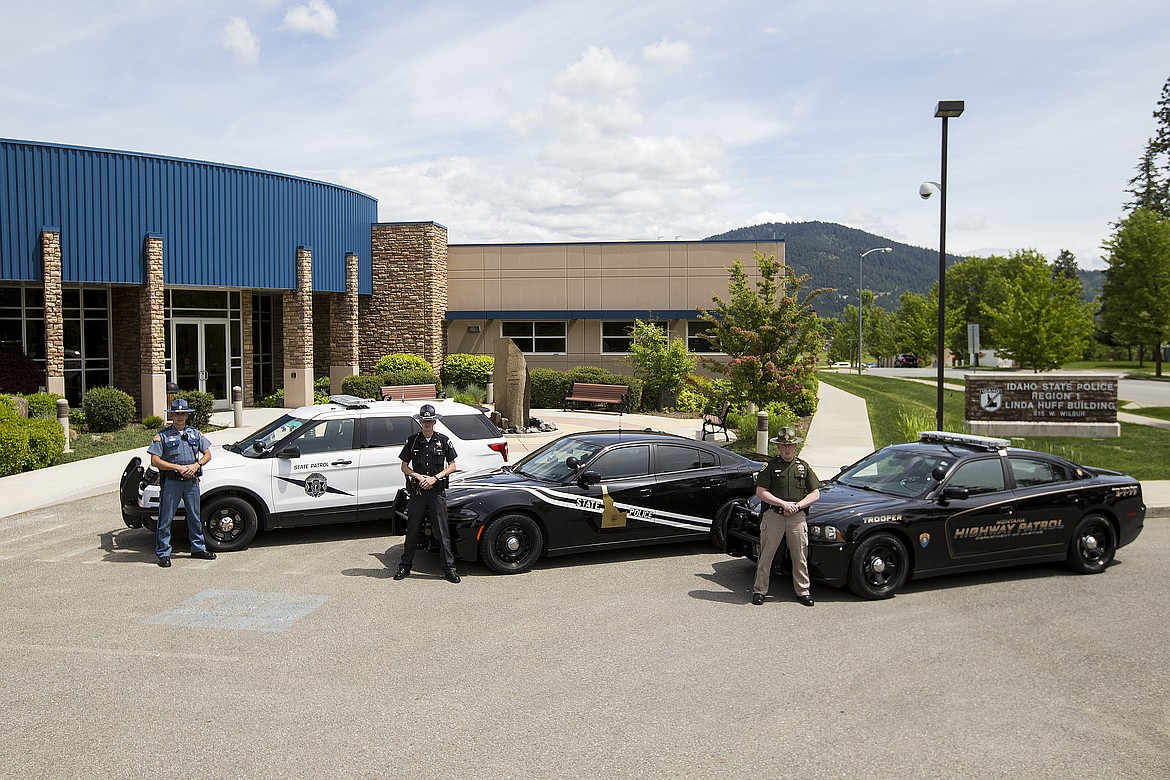 LOREN BENOIT/PressFrom left, Troopers Kyle Witt (Wash.), Troy Tulleners (Idaho), and Luke Burson (Mont.) pose for a group portrait Thursday afternoon at the Idaho State Police Region 1 Linda Huff Building to show a united front against DUIs and traffic hazard violators with summer approaching.