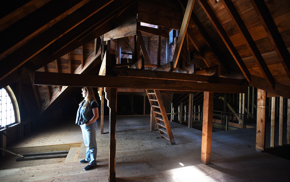 Sherry Lewis-Peterson in the attic of the Old Main building at the Montana Veterans Home on Tuesday, May 23, in Columbia Falls.(Brenda Ahearn/Daily Inter Lake)