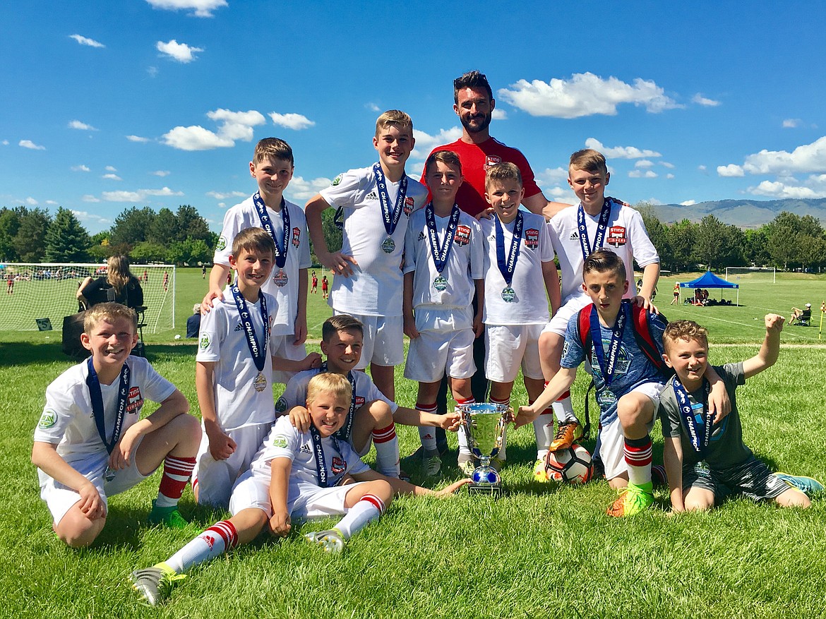 Courtesy photo
The Sting Timbers FC 06B Green boys soccer team won the championship May 20-21 at the Director&#146;s Cup in Boise for the 2006 Boys West Division. STFC opened with a 5-4 win over Arsenal United FC B06 on May 20. Kason Pintler led STFC with 5 goals. Connor Jump had 4 assists and Ben Hannigan-Luther added 1 assist. That afternoon, STFC beat Idaho Rush Black 8-3. Ben Hannigan-Luther and Kason Pintler each had 4 goals in the win. Connor Jump had 6 assists.  Owen Hickok added 1 assist. On May 21, STFC finished undefeated in bracket play with a 9-2 win over Boise Nationals Timbers FC. Kason Pintler had 4 goals. Max Entzi had 3 goals. Connor Jump had 2 goals and 2 assists. Ben Hannigan-Luther had 2 assists. Owen Hickok had 1 assist. That afternoon, STFC won the championship with a 3-1 win over Juniors FC. Kason Pintler had 2 goals. Owen Hickok had a goal and an assist. Braden Latscha added 1 assist and played in goal for STFC Green for all four wins. In the front row from left are Connor Jump, Jaben Cline, Austin Proctor, Ethan Hickok, Braden Latscha and lil' brother Kohen Pintler ('08 player); and back row from left, Ben Hannigan-Luther, Max Entzi, Kason Pintler, Owen Hickok, Logan Delbridge and coach Nick Pintler. Not pictured is Nathan Ringger.