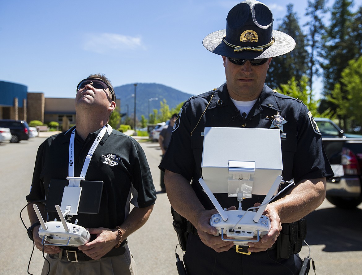LOREN BENOIT/Press

Lt. Alan Oswald, left, and Capt. John Ganske, both with Idaho State Police, demonstrate how to fly drones Tuesday morning. The agency has had an increase in missions since implementing its program about a year ago.