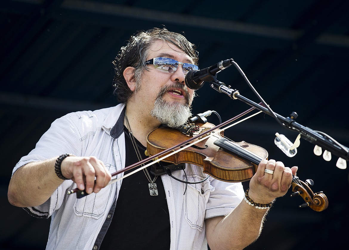 LOREN BENOIT/PressKeith Niehenke with The Hanksters performs on stage at Spring Fest on Saturday. The 5 piece band plays country, southern rock and blues and can be seen live this weekend.