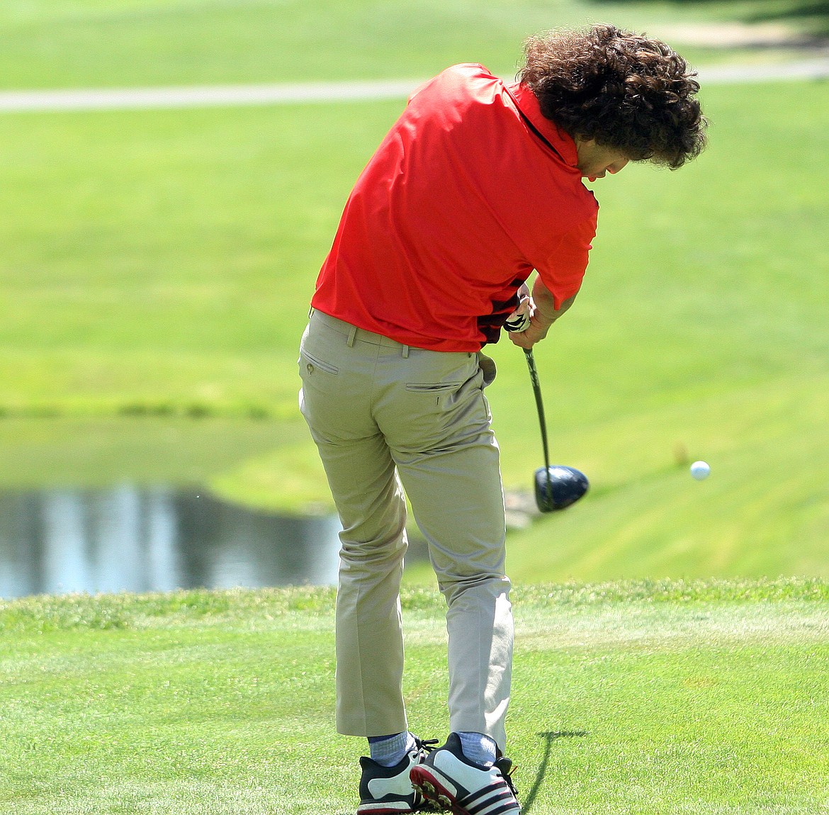 Rodney Harwood/Columbia Basin HeraldOthello freshman Patrick Azevedo rips into his drive off the 12th tee on Wednesday at the 2A boys state golf championships at The Creek at Qualchan in Spokane. Azevedo finished as the individual medalist.