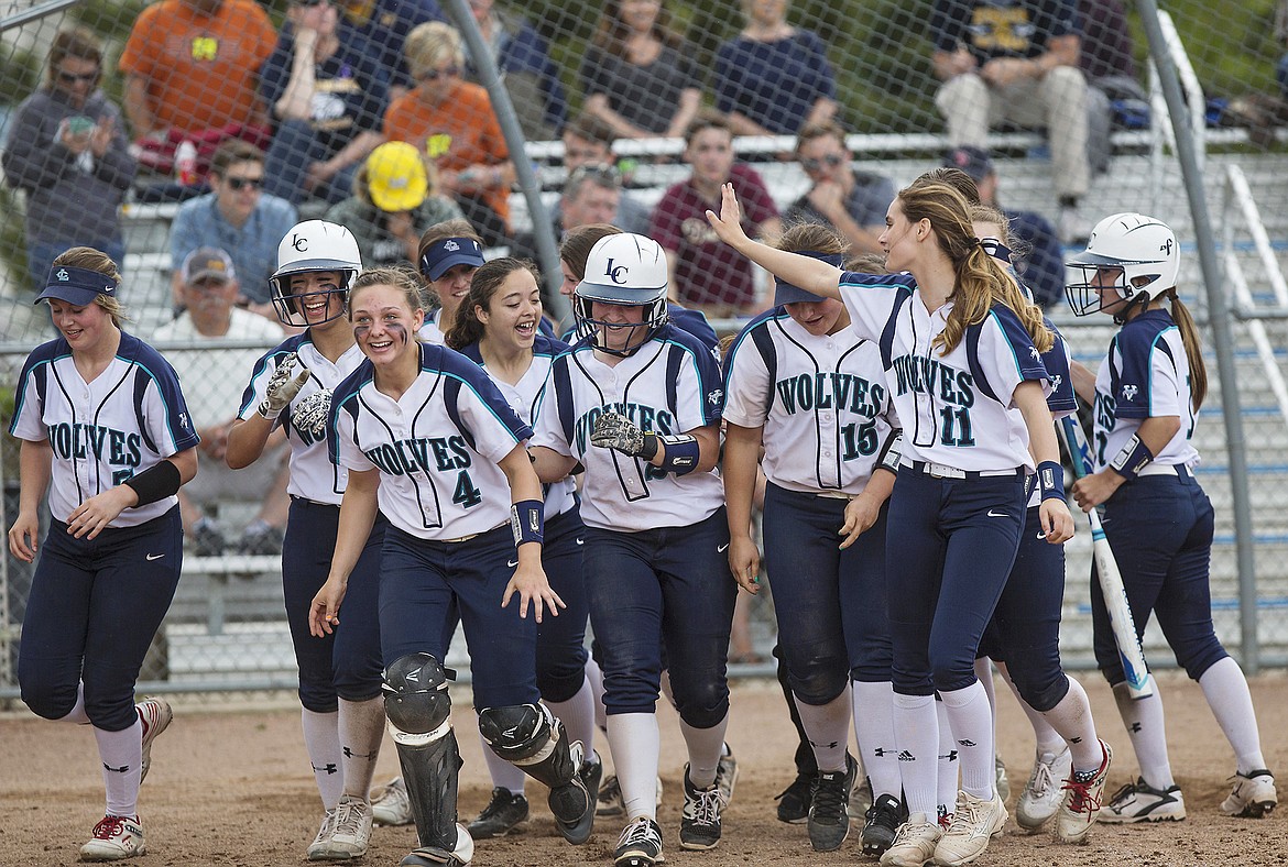 LISA JAMES/Press
Lake City players celebrate their 8-2 lead over Meridian at the end of the 6th inning during the first of the 5A State Championship games at Coeur D&#146;Alene High School on Friday. Lake City won 8-2  to advance to the next bracket.