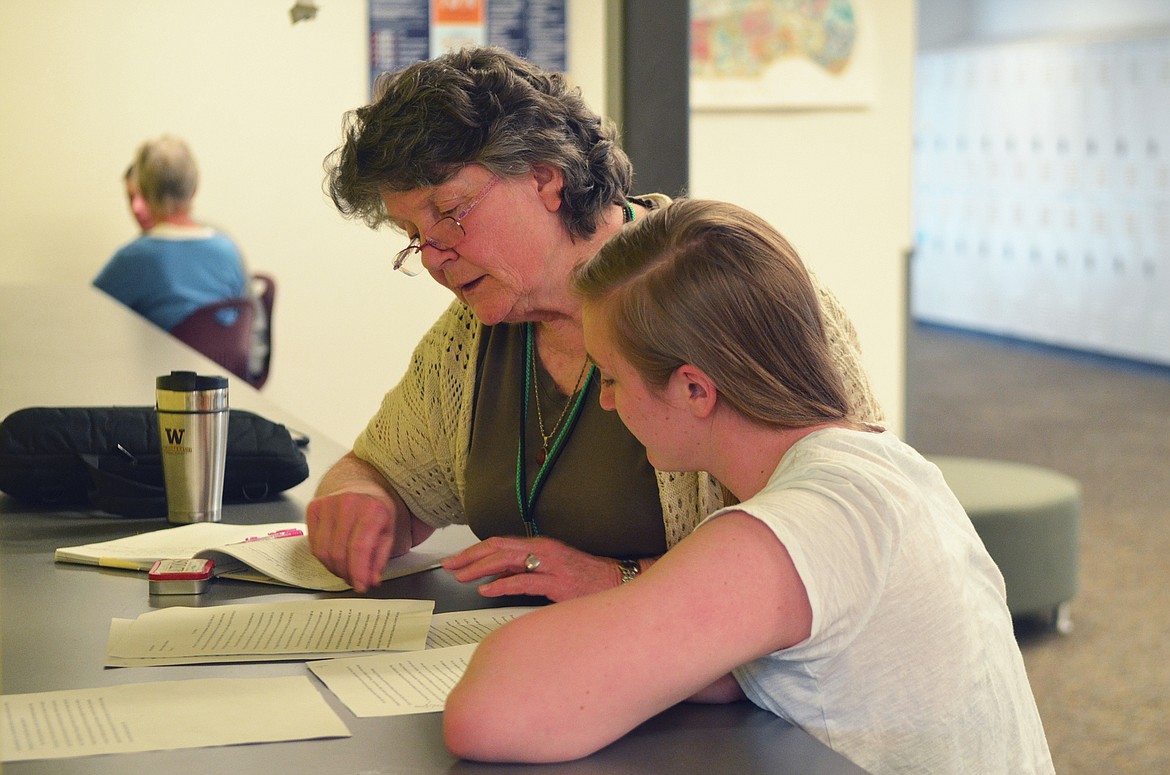 Writing coach Ruth Harrison works with Annisa Brown at Whitefish High School. (Daniel McKay/Whitefish Pilot)