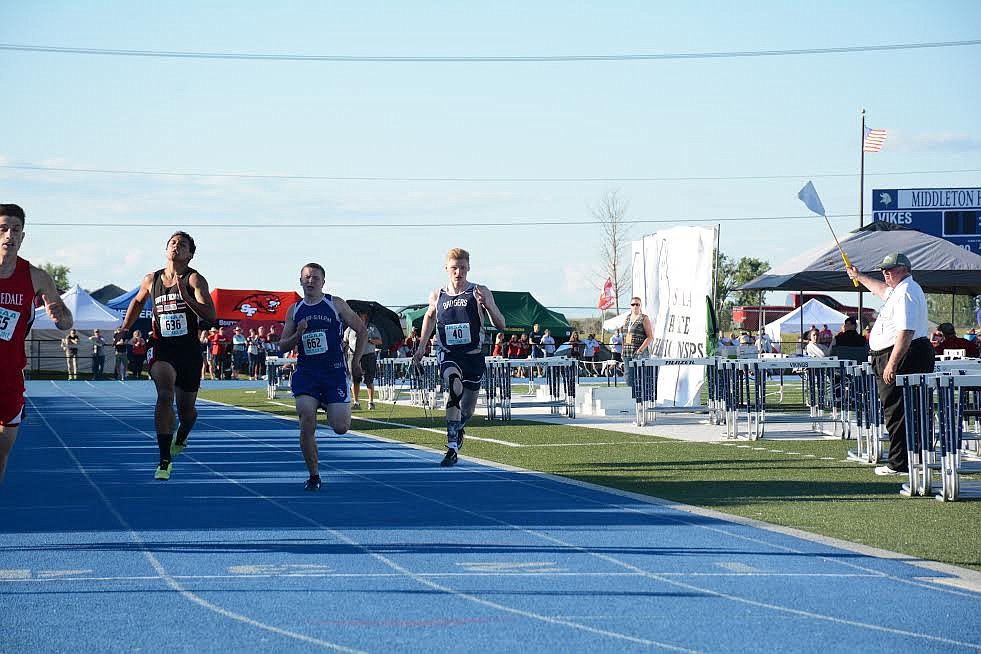 Photo by ROBERT LAVALA
Nikolous Bertling, 200m Run sets a personal best with a time of 23.92s.