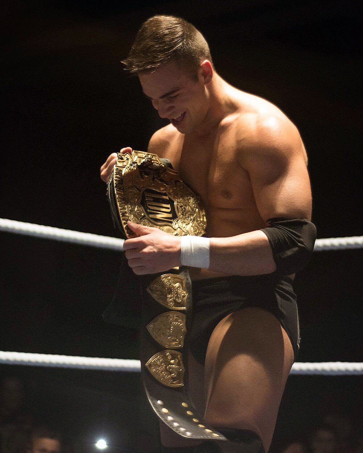 FLIP GORDON, who grew up in the Flathead Valley as Travis Lopes, admires the LDN Wrestling world championship belt he won earlier this year. (Courtesy photo)