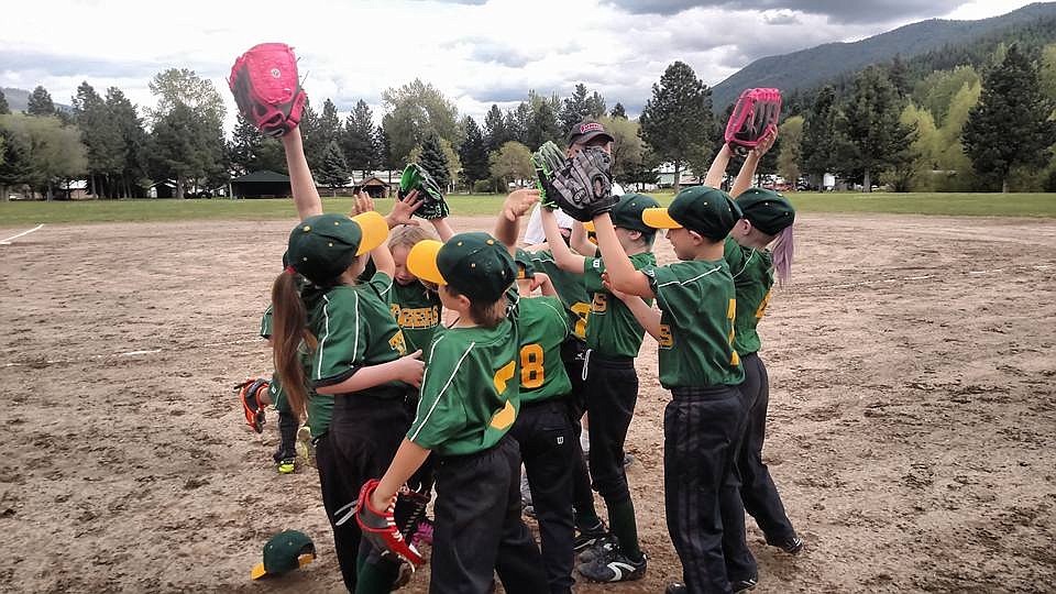 The St. Regis Rookies celebrate their last game of the season last week. (Photo courtesy of St. Regis Youth Baseball Facebook).