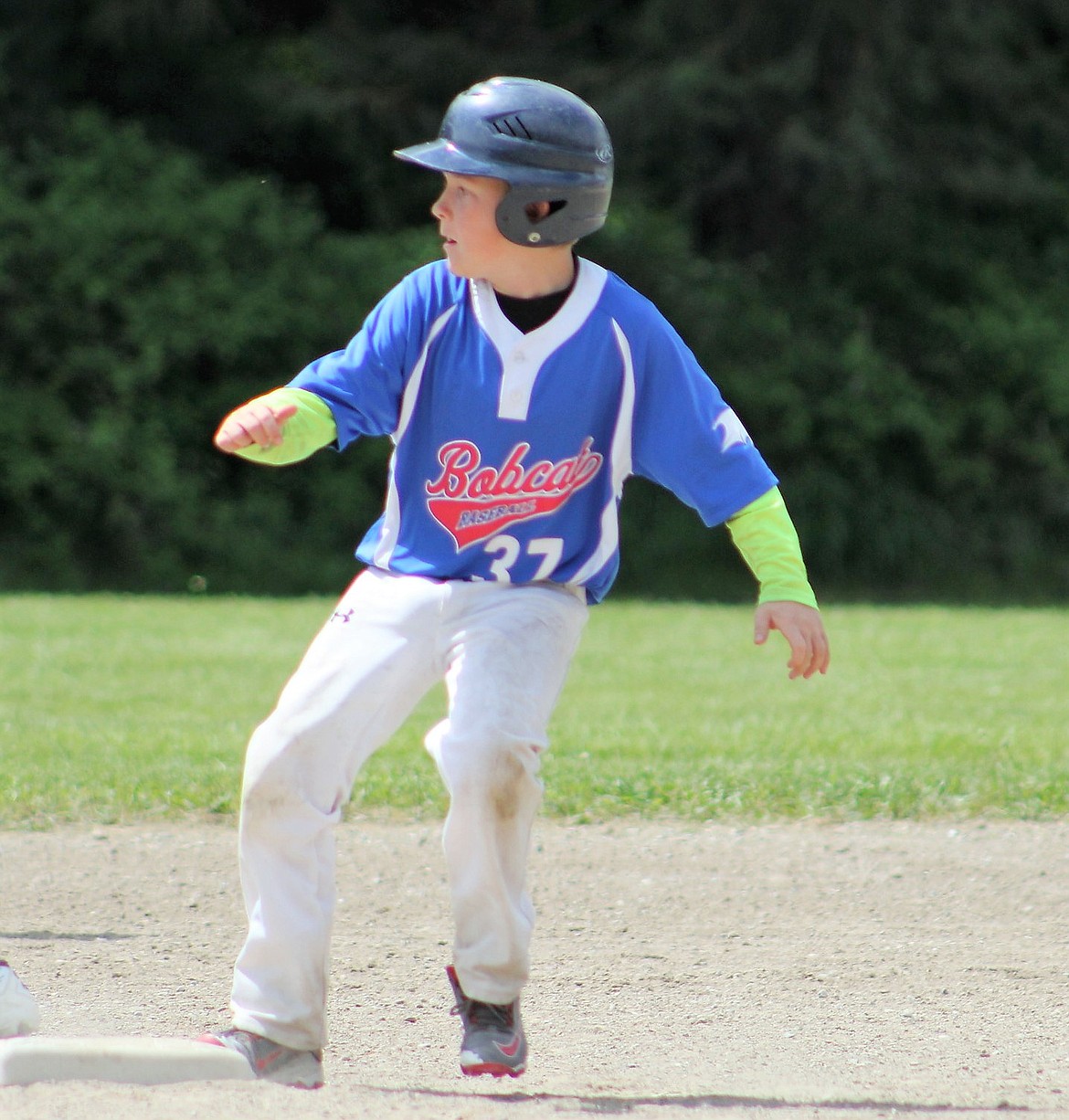 Logan Tucker stops on second base during a game against Thompson Falls. (Kathleen Woodford/Mineral Independent).