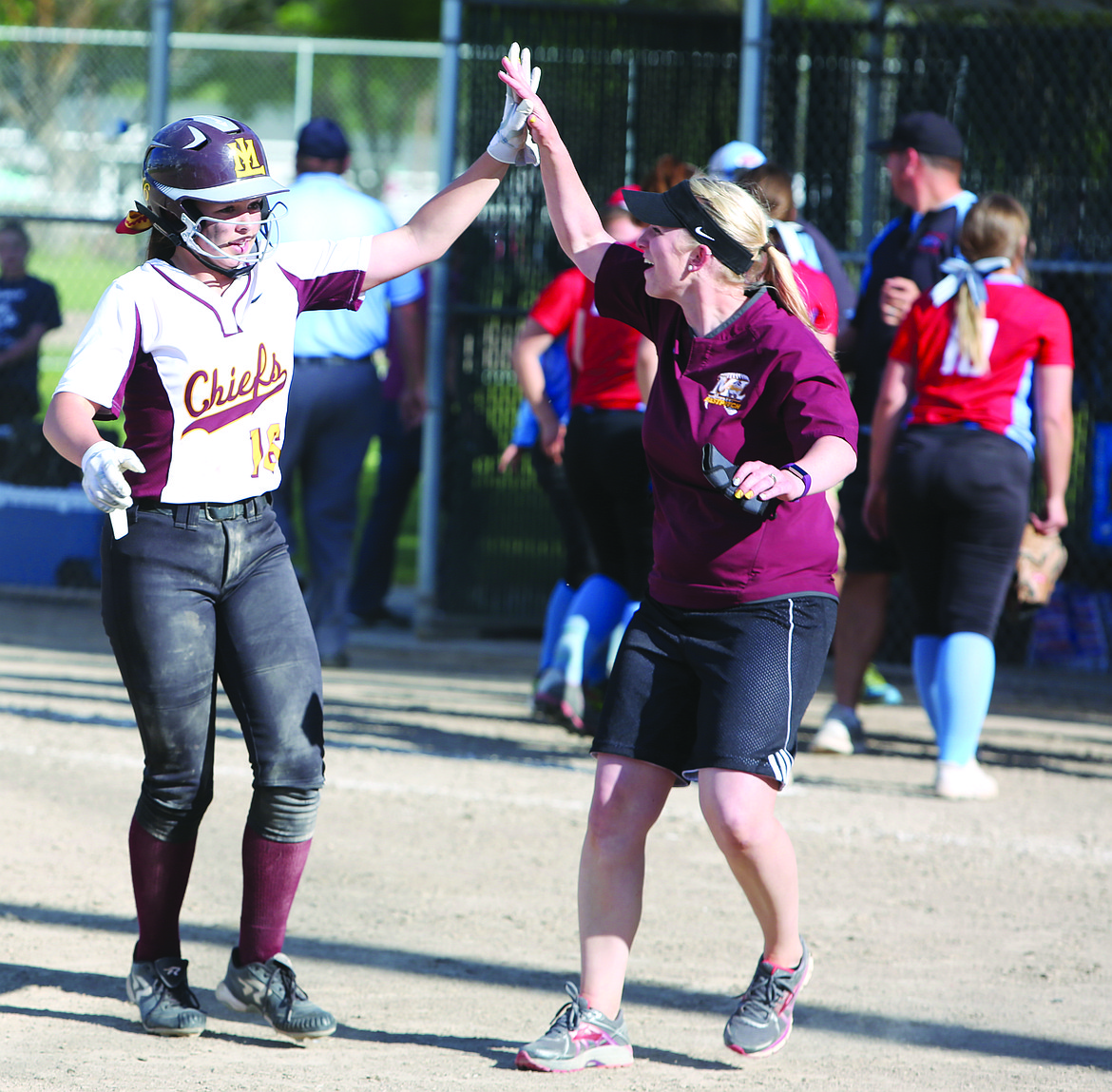 Connor Vanderweyst/Columbia Basin Herald
Savannah Ashley is congratulated after her game-winning hit.