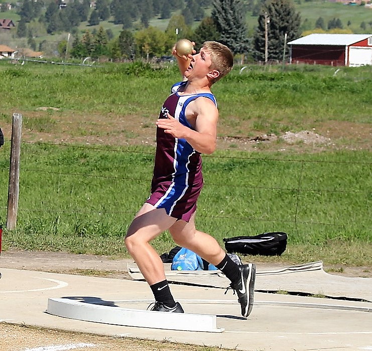 Trey Green tosses the shot put during Divisionals last week, but will not be taking the next step to State. (Kathleen Woodford/Mineral Independent).