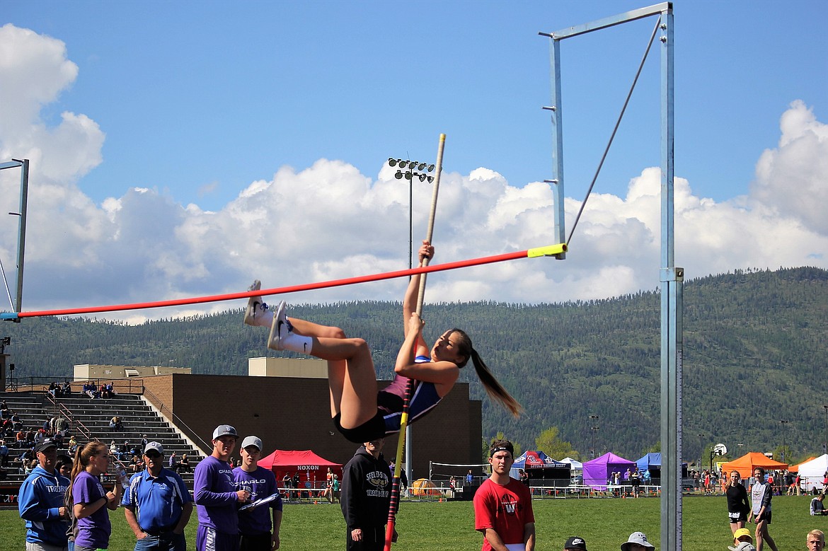 Clark Fork Kenzie Mueller took one of her final pole vaults for the season during Divisionals on Thursday and Friday. (Kathleen Woodford/Mineral Independent).