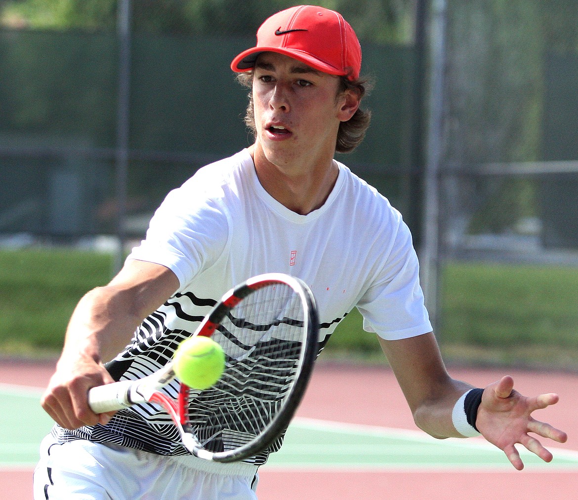 Rodney Harwood/Coilumbia Basin HeraldOthello junior Kyler Villarreal hits a backhand return during his doubles championship match at the 2A District 5-6 tennis tournament on Saturday at Ephrata High School.