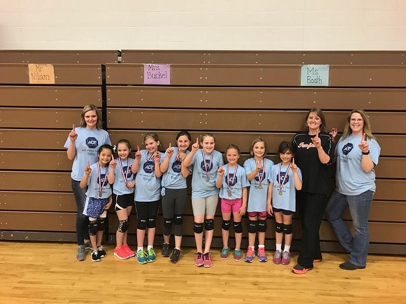 Courtesy photo
ADT Security Services won the third- and fourth-grade volleyball championship for Post Falls Parks and Recreation on May 20. From left are coach Geena Duczel, Dacia Wilder, Cierra Lehti, Emily Rosa, Gabby Misita-Valente, Annalyse James, Lauren Reardon, Paige Day, Olivia de Souza, coach Tarra Reardon and coach Erin James. Not pictured is Olivia Hollenbeck.
