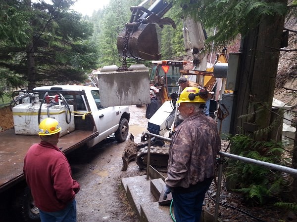 Above: Work crews just outside of the damaged portal.