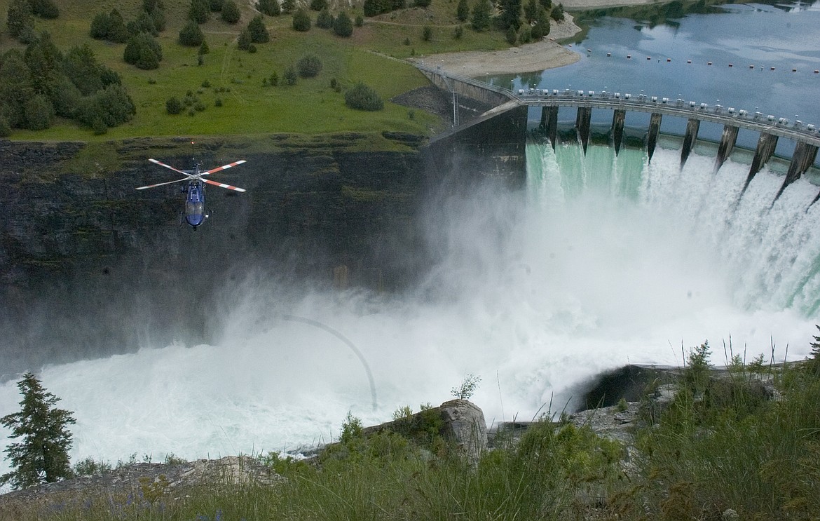 A helicopter from Two Bear Air contributed to the search for a man who reportedly fell into the Flathead River below the Selis Ksanka Qlispe Dam Overlook Wednesday afternoon. (Brett Berntsen/Lake County Leader)