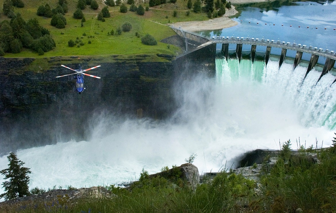 A helicopter from Two Bear Air contributed to the search for a man who reportedly fell into the Flathead River below the Selis Ksanka Qlispe Dam Overlook Wednesday afternoon. (Brett Berntsen/Lake County Leader)