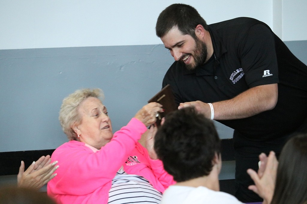 Courtesy photo 
Mullan athletic director Stetson Spooner presents Carol Foster with the Mullan High School lifetime appreciation award. Foster and her husband Morgan won the award. Morgan passed away earlier this year.