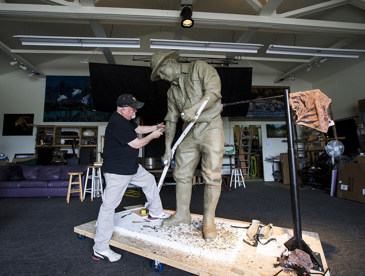 LOREN BENOIT/Press
Artist Terry Lee sculpts an Idaho farmer inside his Hayden studio on Wednesday. The sculpture, commissioned by Doyle Jacklin, will be finished in September and will be placed by the Working Man statue in Coeur d&#146;Alene. Local artists, like Terry Lee, will be opening up their studios for Artists Studio Tour,  from 10 a.m. to 4 p.m. June 10-11. Tickets for the tour are available online at artsandculturecda.org/artist-studio-tour or at the Coeur d&#146;Alene Visitor Center at 105 N. First St. in Coeur d&#146;Alene.