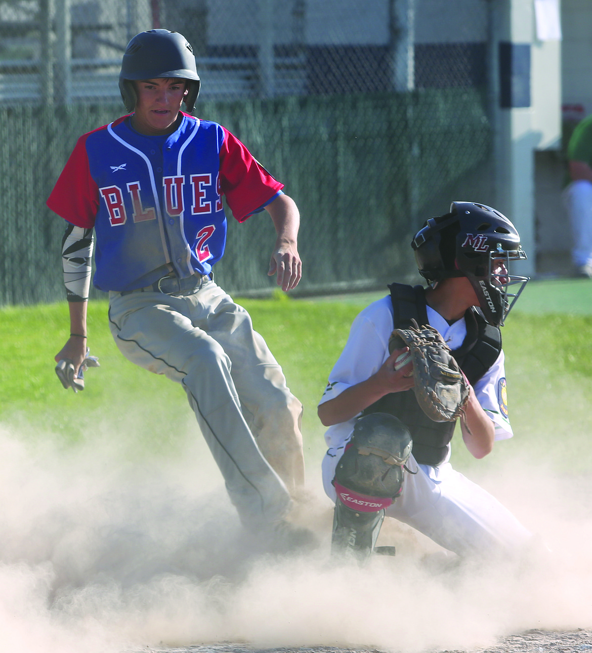 Connor Vanderweyst/Columbia Basin Herald
Moses Lake catcher Tre Ramirez is unable to tag out a Wenatchee runner in Game 1 of Monday&#146;s doubleheader.