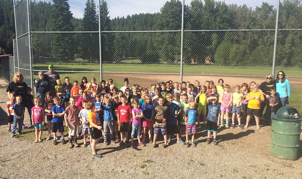 Libby Elementary School first graders pose for a group photo after cleaning up the area surrounding the baseball fields Wednesday, June 7, 2017. (Courtesy Photo)