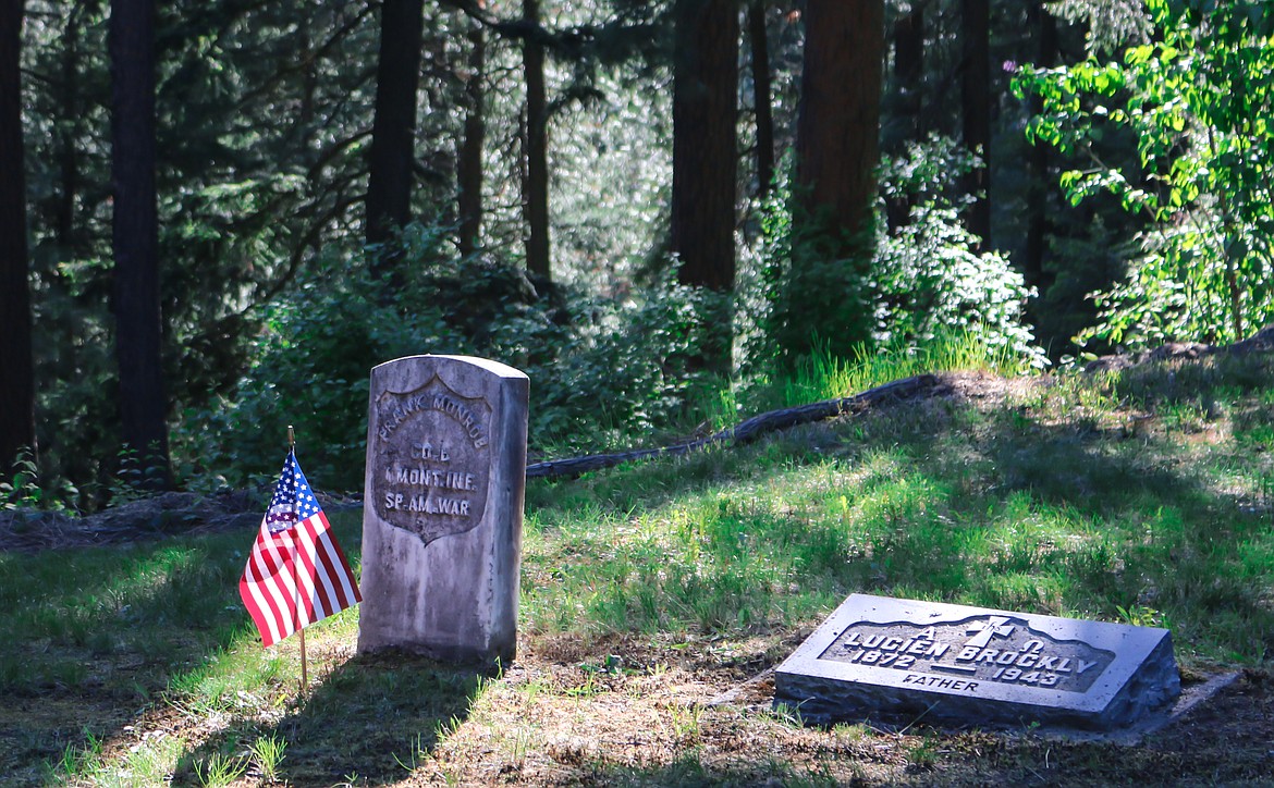 Photo by Mandi Bateman
Flags are placed on the graves of veterans before Memorial Day at Grandview Cemetery.