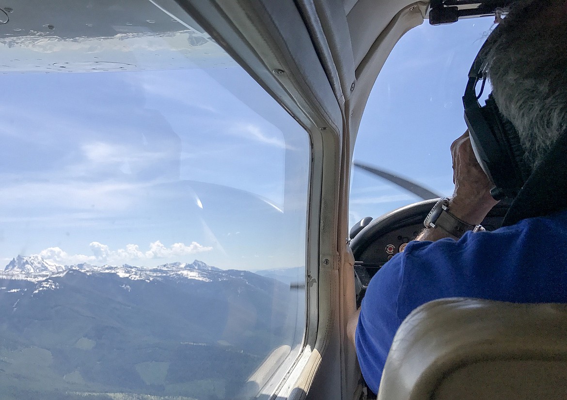 Bruce Gordon of Colorado-based nonprofit Ecoflight flies toward the proposed Scotchman Peaks wilderness area Tuesday, May 30, 2017. (John Blodgett/The Western News)