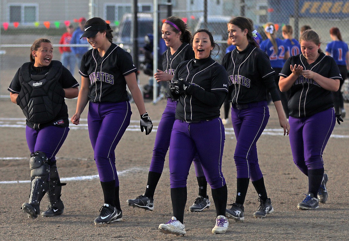 THE POLSON Pirates&#146; team celebrates after their 2-0 victory against Columbia Falls in the quarterfinals of the loser&#146;s bracket Friday night at Sidney. With the victory, the Pirates advanced to play Frenchtown, a team that eventually lost the Class A state championship to Belgrade on Saturday. Belgrade, became the first team since 2012 to be Class A state champion dethroning the four-time defending state-champion Lady Broncs. (photo courtesy of Bob Gunderson)