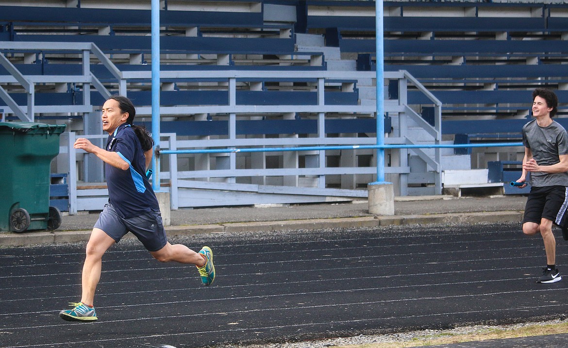 Assistant Coach Paul Bonnell took to the track to inspire and encourage the members of the team.