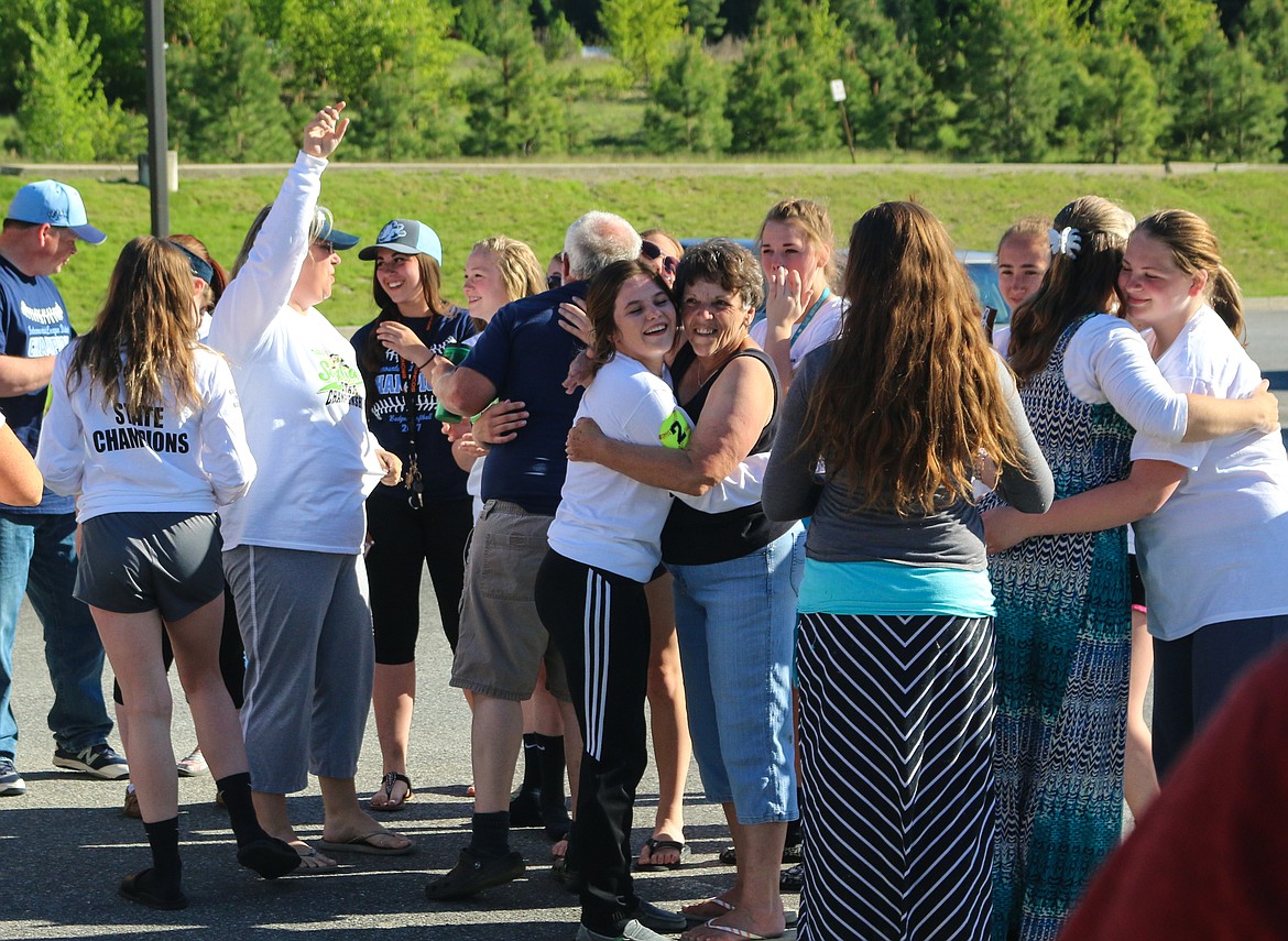 Photos by MANDI BATEMAN
Coach Tomi Bateman celebrates with her 3A state softball champions.