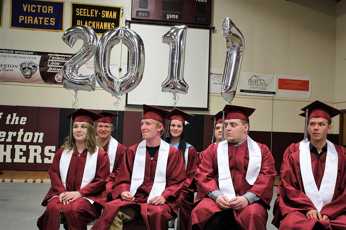 The Alberton graduating class sits beneath balloons announcing their 2017 graduation. (Kathleen Woodford/Mineral Independent)