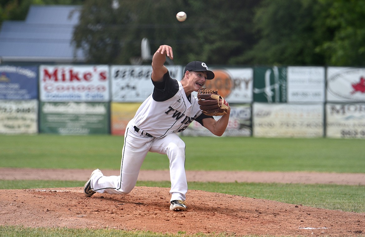 Glacier Twins pitcher Coby Clark-Dickinson fires in a pitch against Cranbrook on Saturday. (Aaric Bryan/Daily Inter Lake)