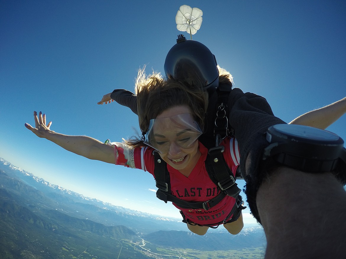 A jumper and tandem instructor in freefall above Whitefish. (Photo courtesy of Skydive Whitefish)