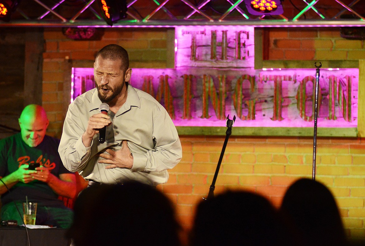 JONATHAN OWNENS performs an AC/DC song at a talent show at the Remington Bar in downtown Whitefish on June 13. (Matt Baldwin photos/This Week in the Flathead)