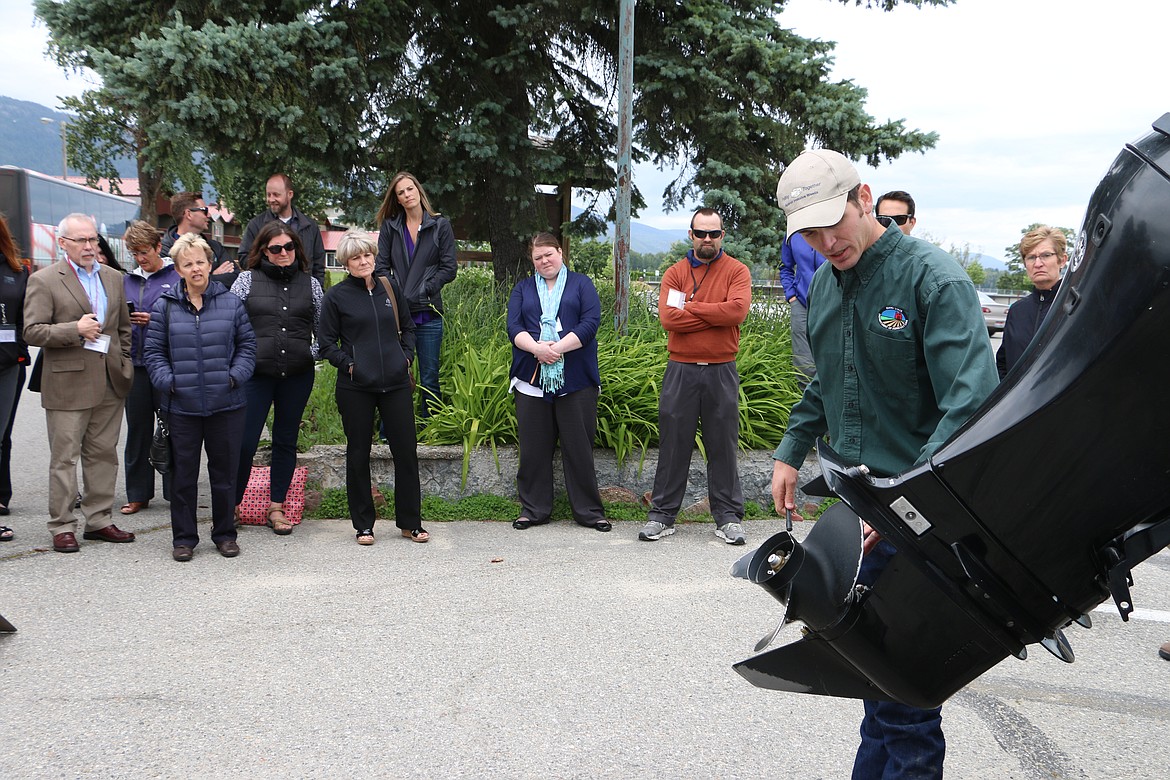 Nic Zurfluh, right, ag program specialist with the Idaho Department of Agriculture&#146;s plant industries division, demonstrated how a boat is checked for invasive species at inspections stations to members of Idaho&#146;s Joint Finance-Appropriations Committee, who were in town Tuesday on their spring tour.

(Photo by MARY MALONE)