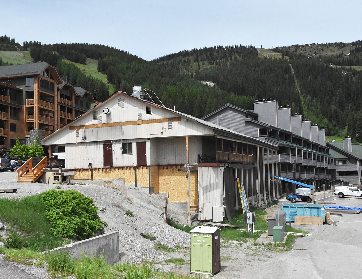 Crews are removing the back balcony of the Bierstube in the Village at Whitefish Mountain Resort, one of several improvements planned for the bar this year.