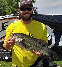 Courtesy photo - Keegan Anderson with a 6.76 Largemouth bass caught during the Limit Out Marine Big Bass tournament. This fish earned Keegan and his partner, JR Clark a first place finish and a check for $6,950.