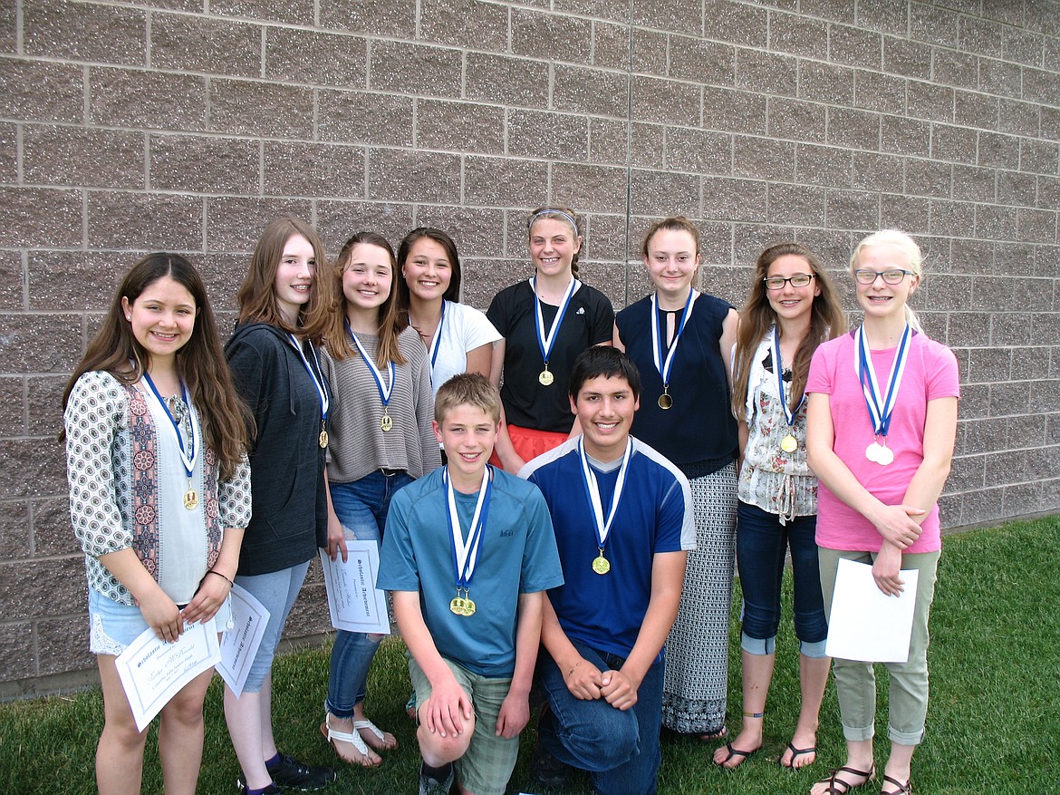 These Columbia Falls eighth-graders were honored for scholastic achievement. Back row from left, Raedyn McDonald, Emily Ingbertsen, Emmalee Hellen, Ella Hutcheson, Hannah Schweikert, Jesse Rusche, Kate Hatfield, and Lara Erickson. Front row from left, Winslow Nichols and Tre Finley. (Photo provided)