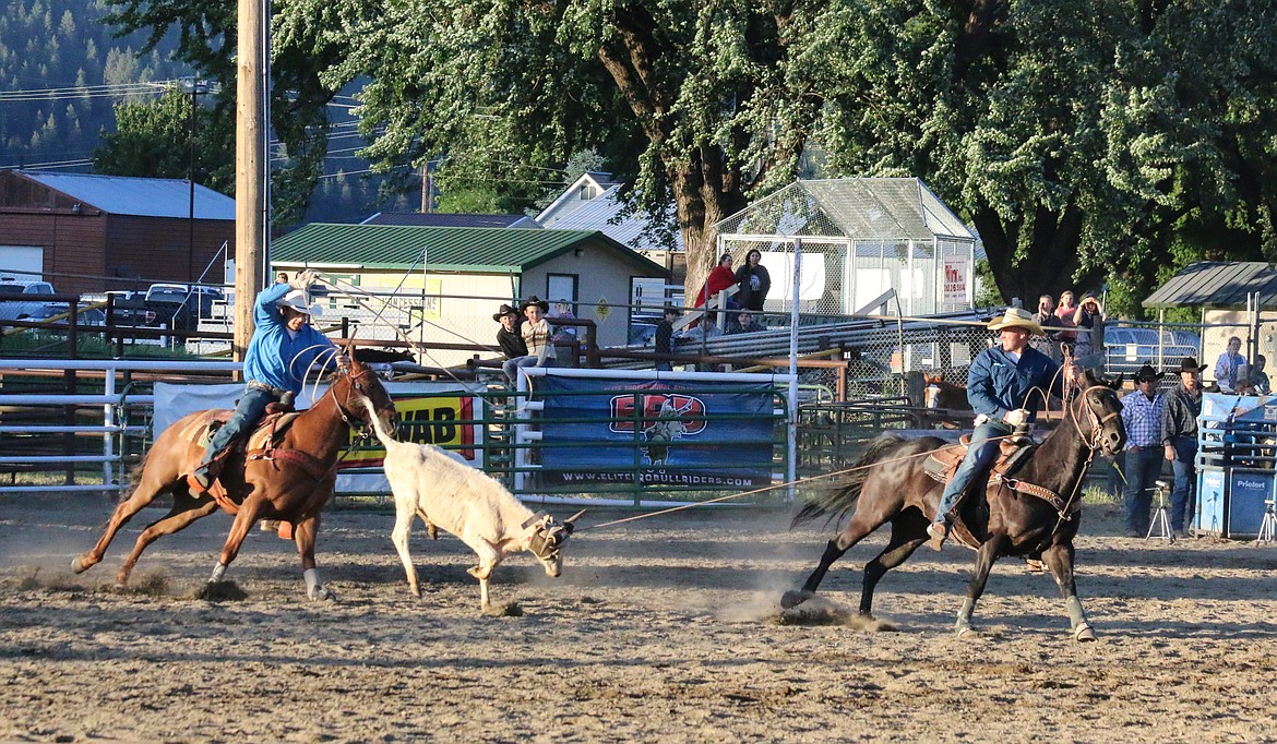 Photo by Mandi Bateman
Andy Rice (header) and brother Matt Rice (heeler), take on the competition in the team roping competition.