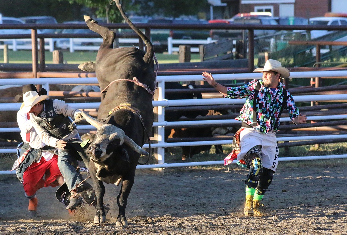 Photo by Mandi Bateman
Bullfighters, Drew Payne and Tyler McDade, put their lives on the line for the bull riders.